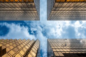 Golden skyscrapper building with blue sky in Hong Kong