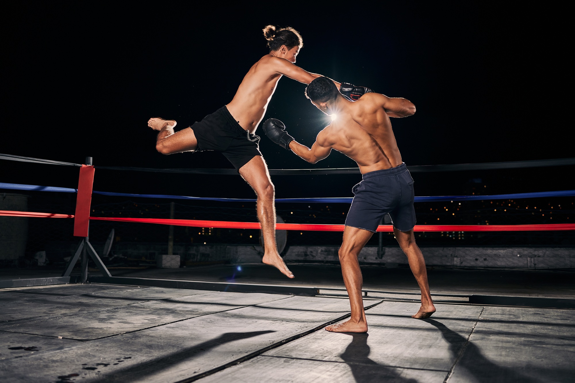 Mma, muay thai and fight with a boxing coach and training for health, fitness and sport exercise in