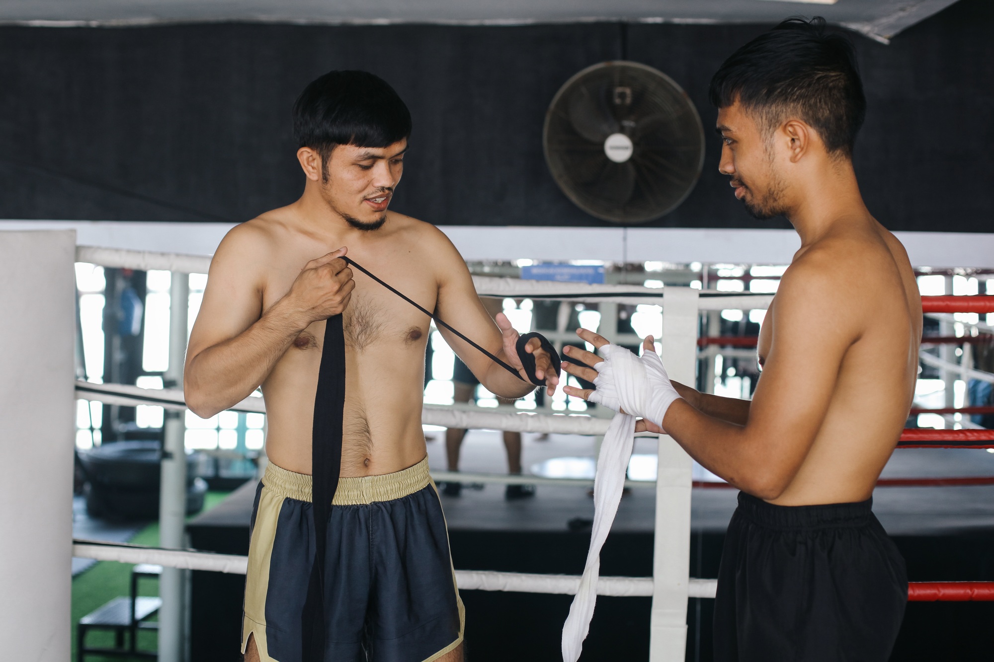 Muay Thai Man Wearing Elastic Bandage Sport For Preparing